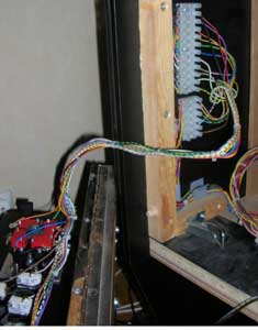 The white contacts can be removed and should be removed when you open up the front of your cabinet